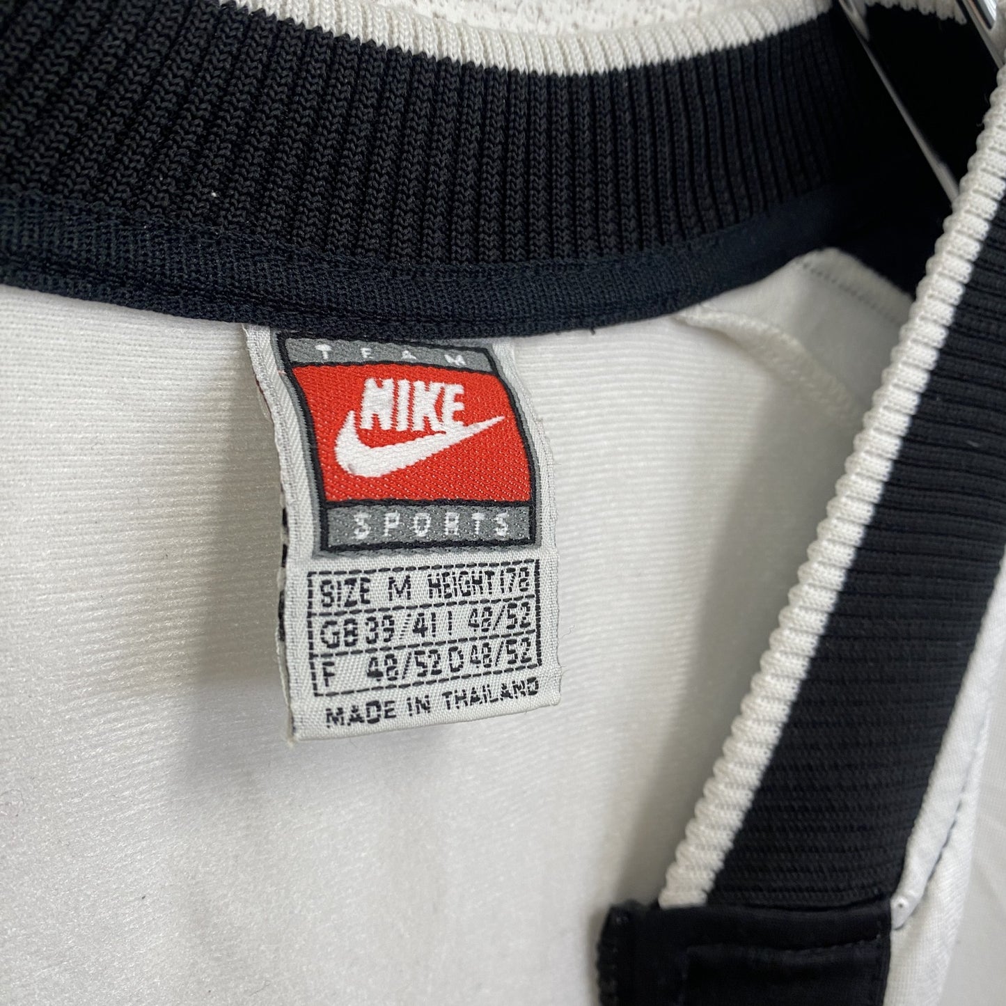 古着 used 90s NIKE ナイキ 半袖フルジップジャージ スウッシュロゴ プリントデザイン バイカラー 黒 白 Mサイズ