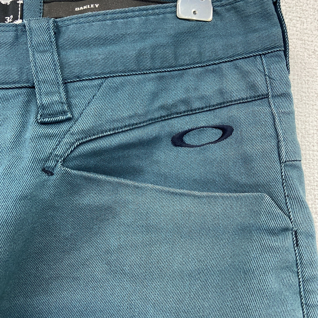 OAKLEY　オークリー　ストレッチパンツ　ジップフライ　ターコイズブルー　W32サイズ　古着
