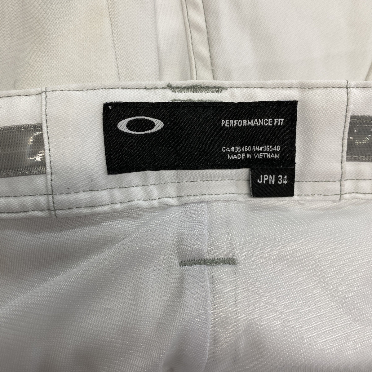 OAKLEY　オークリー　Skull 3D Tapered　ストレッチパンツ　白　ホワイト　34サイズ　古着