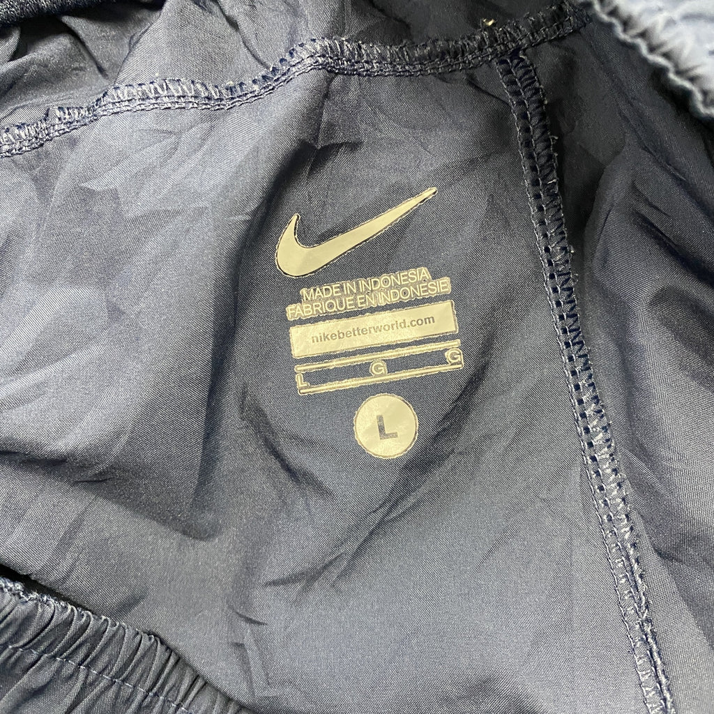 NIKE　ナイキ　ピステパンツ/ウィンドパンツ　トラックパンツ　スウッシュ　紺　ネイビー　Lサイズ　古着