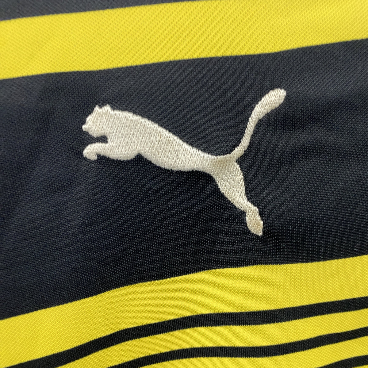 PUMA　プーマ　半袖プリントTシャツ　黒　黄色　ブラック　イエロー　Mサイズ　古着