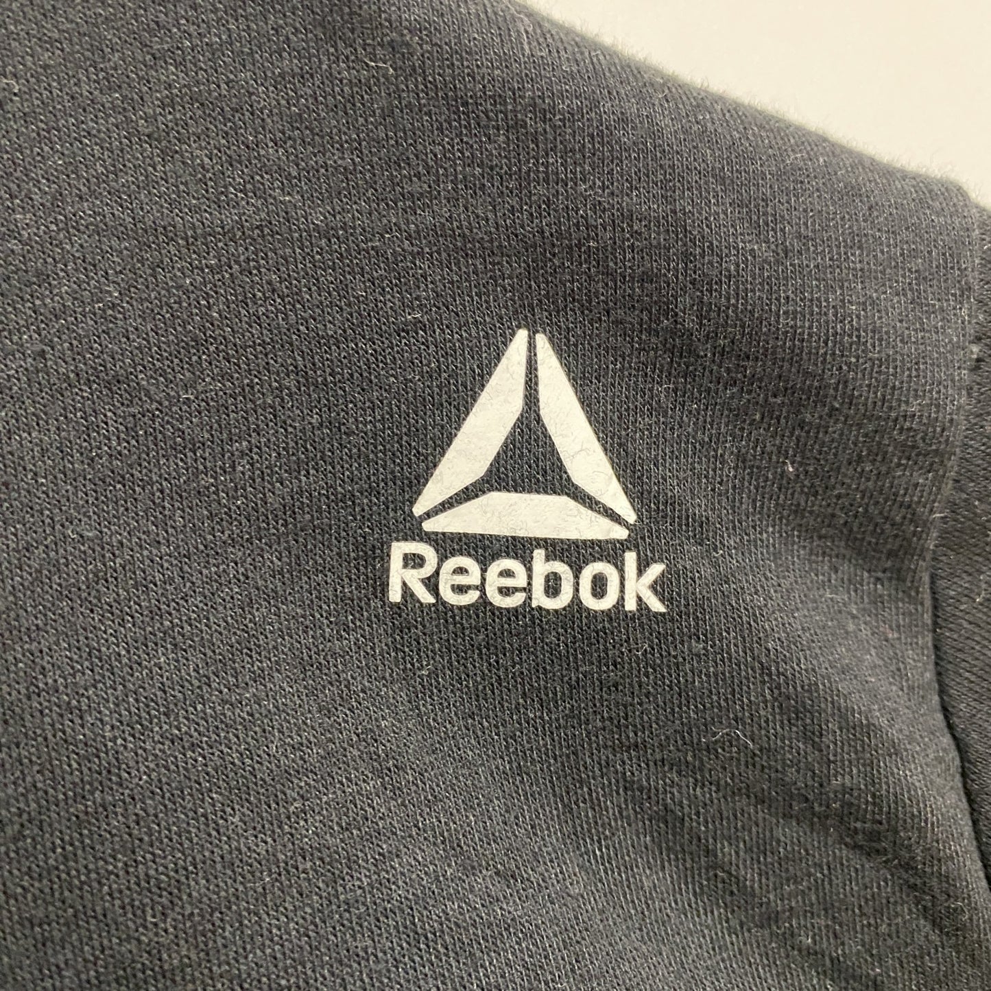 古着 used　Reebok　リーボック　長袖ロゴプリントパーカー　スウェットプルオーバー　黒　ブラック　秋冬服　Lサイズ