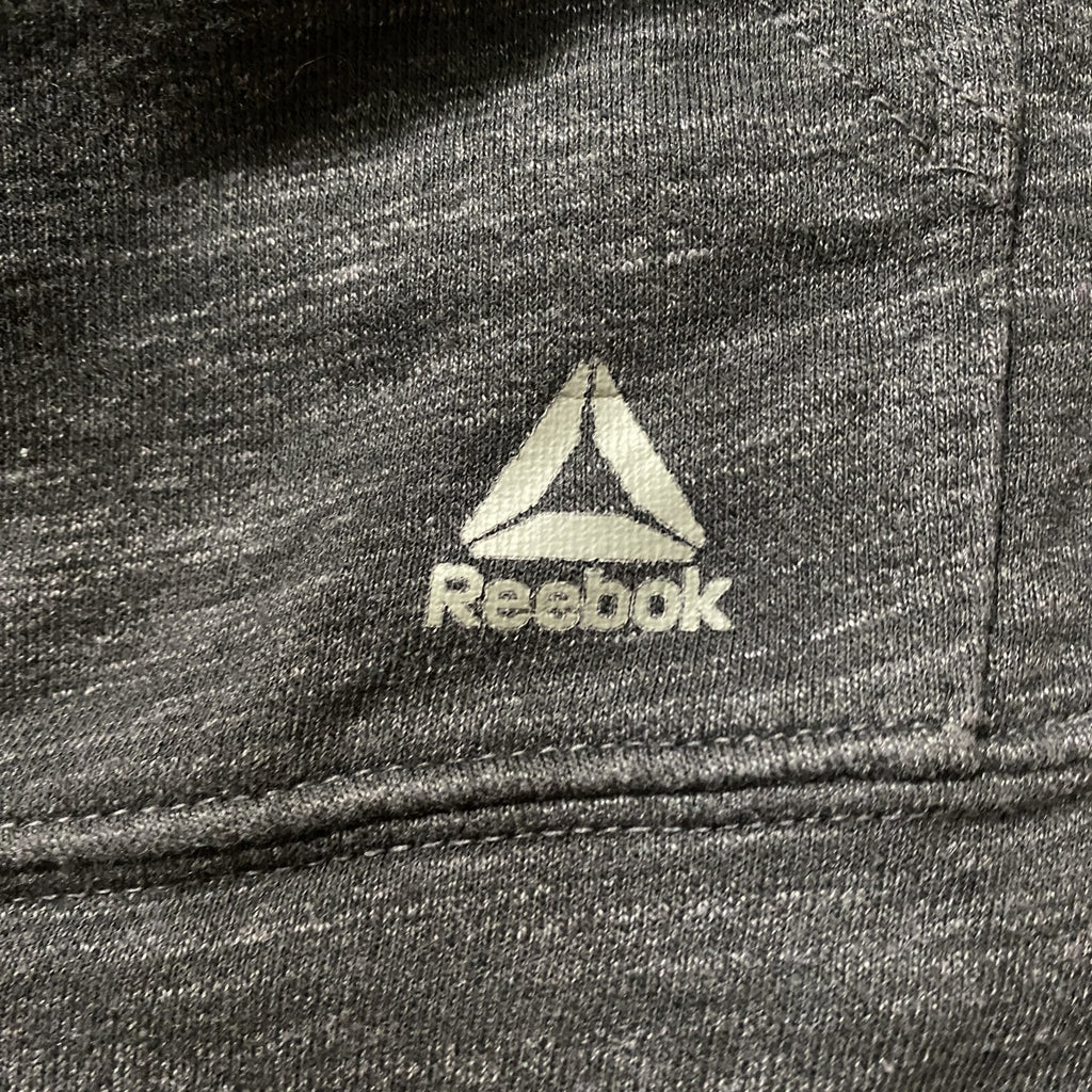 Reebok リーボック 長袖ワンポイントロゴ袖レイヤードプルオーバーパーカー　個性的　チャコール　古着
