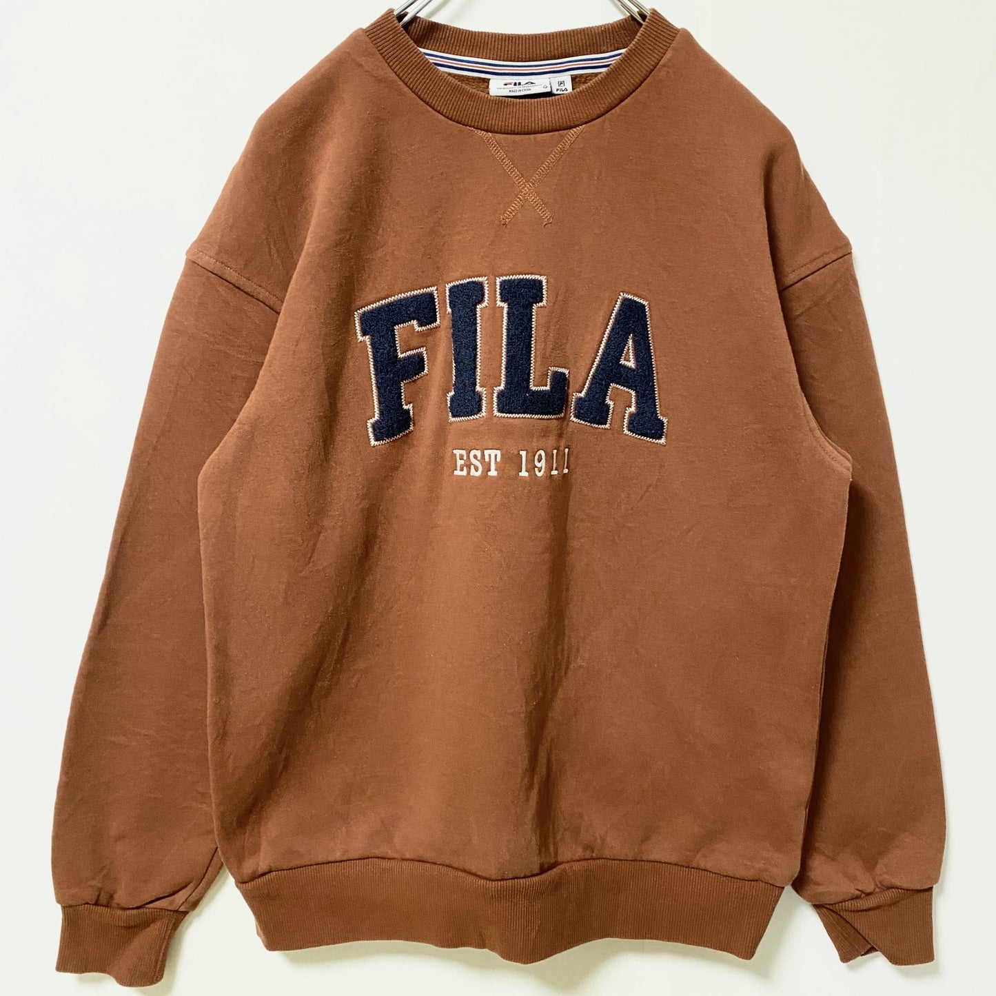 古着 used FILA フィラ　長袖クルーネックビッグロゴスウェット　トレーナー　レトロデザイン　ブラウン　XSサイズ