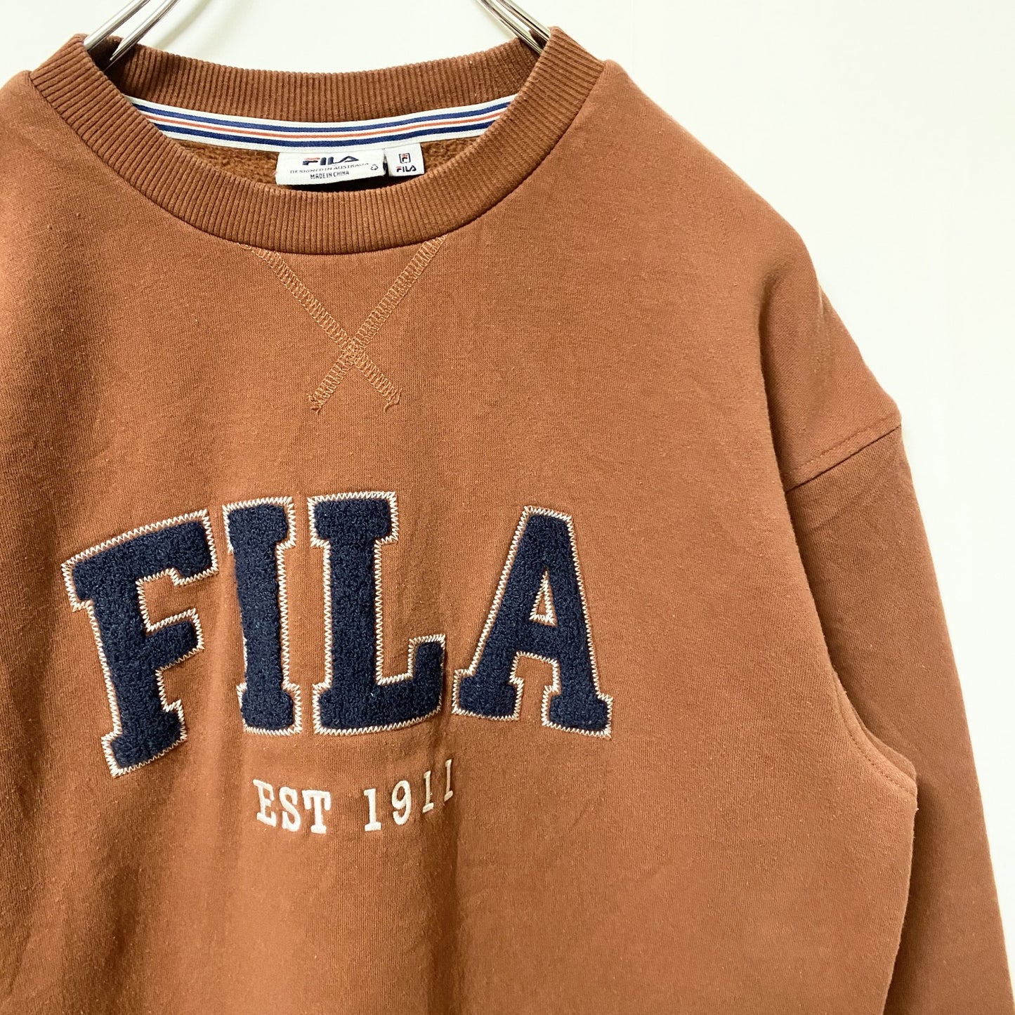 古着 used FILA フィラ　長袖クルーネックビッグロゴスウェット　トレーナー　レトロデザイン　ブラウン　XSサイズ