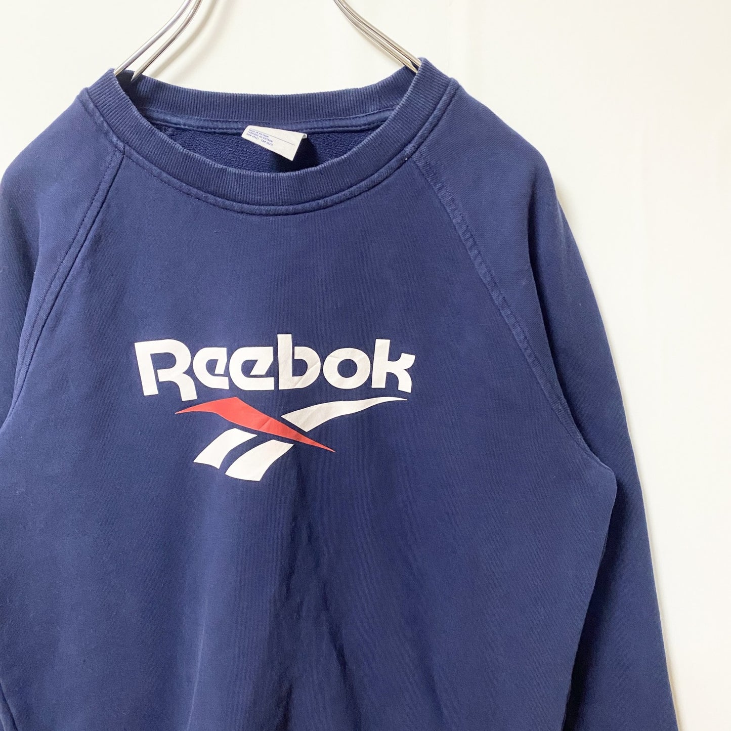 古着 used　Reebok　リーボック　長袖クルーネックロゴプリントスウェット　トレーナー　ラグランスリーブ　ネイビー　Sサイズ