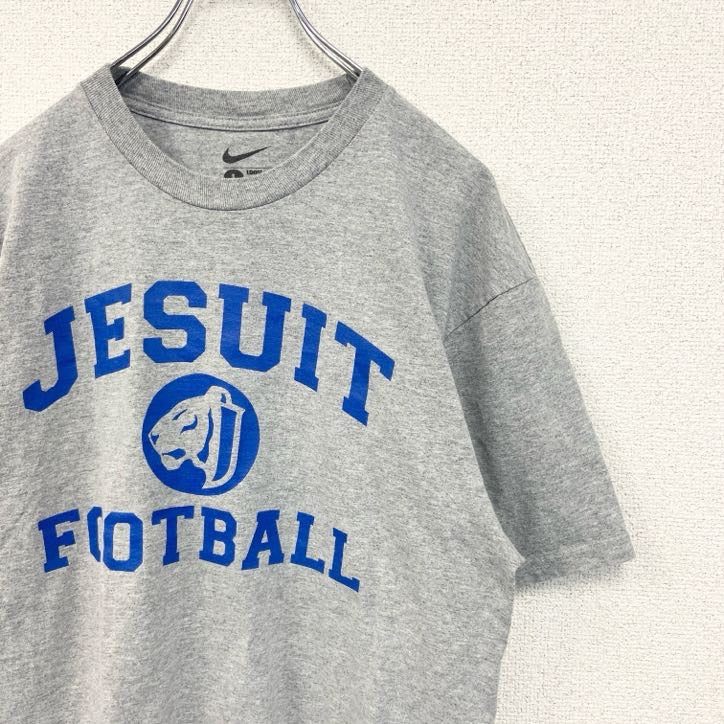 古着 used　NIKE　ナイキ　半袖カレッジプリントTシャツ　JESUIT　FOOTBALL　レトロデザイン　グレー　Lサイズ