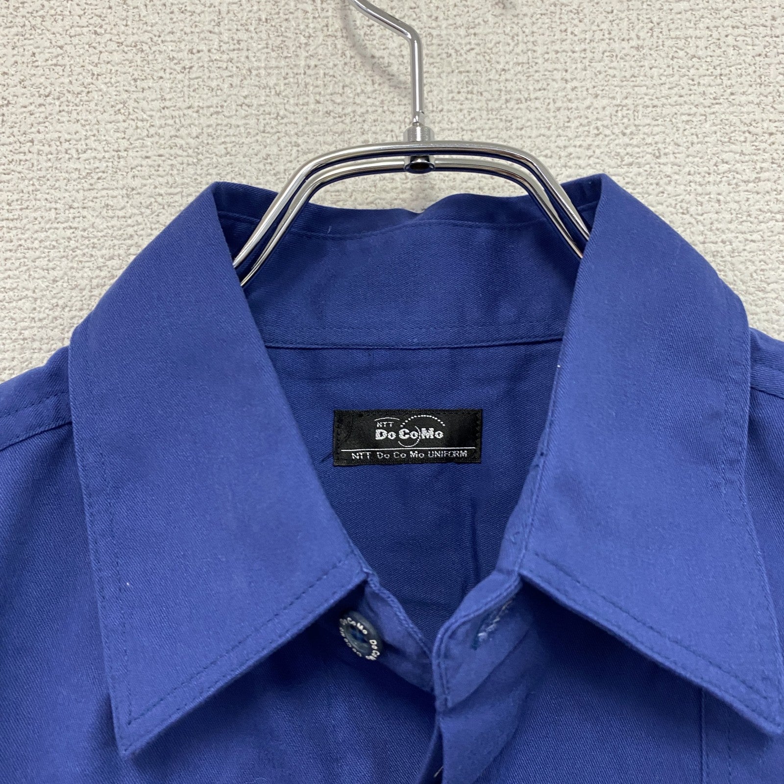 90s　NTT DOCOMO　ドコモ　長袖ワークシャツ　比翼仕立て　デカロゴ　企業　ヴィンテージ　青　ブルー　Mサイズ　古着