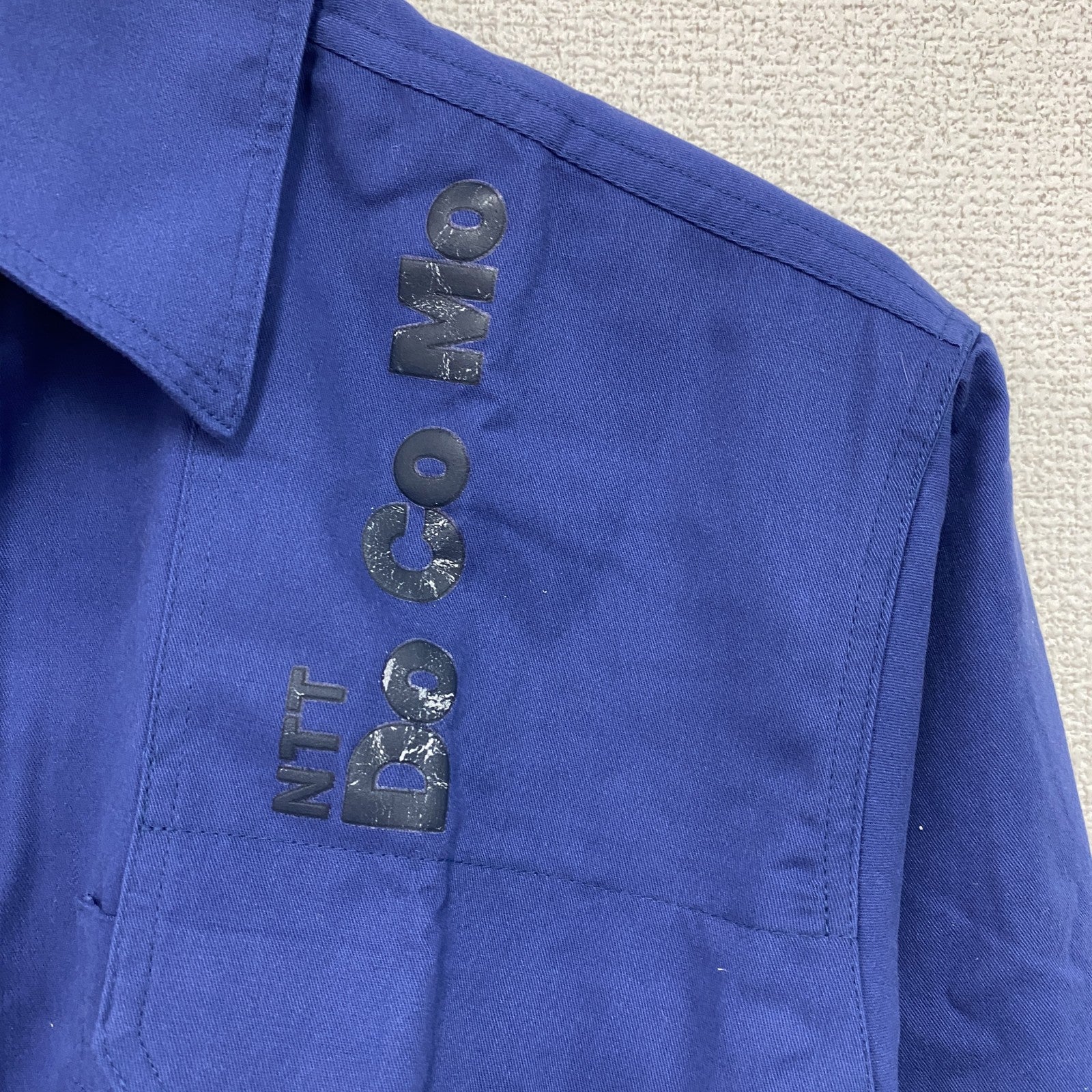 90s　NTT DOCOMO　ドコモ　長袖ワークシャツ　比翼仕立て　デカロゴ　企業　ヴィンテージ　青　ブルー　Mサイズ　古着