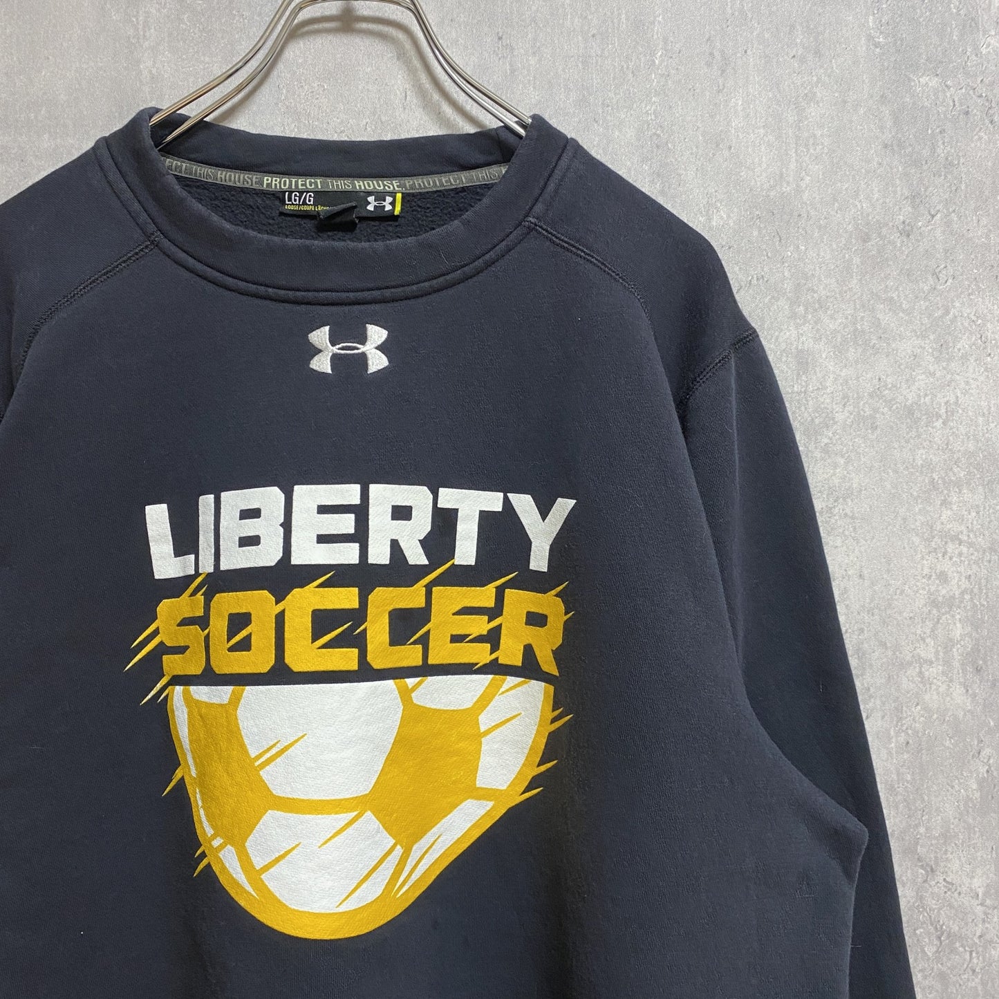 古着 used　アンダーアーマー　LIBERTY SOCCER　長袖プリントスウェット　トレーナー　黒　ロゴ刺繍　Lサイズ