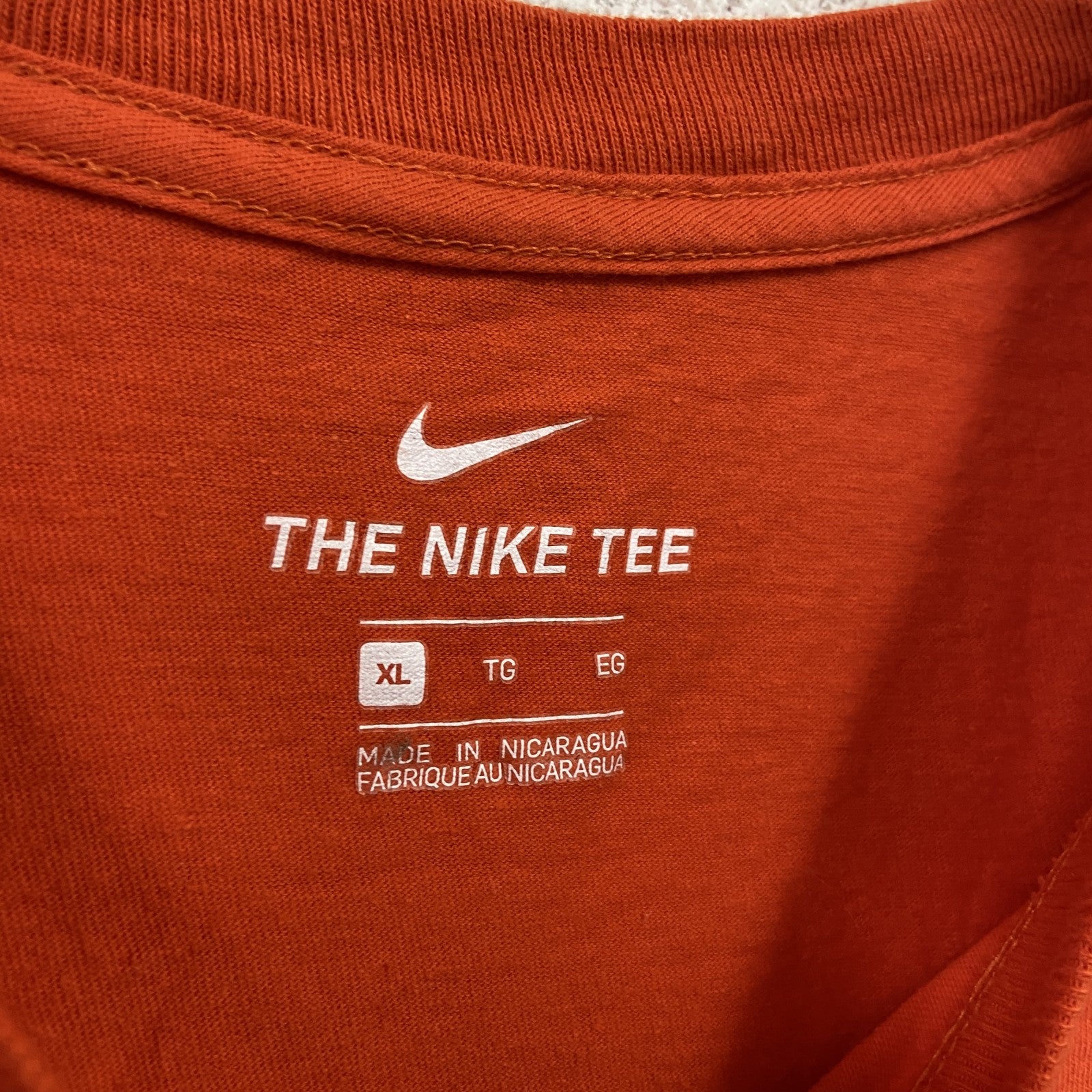 NIKE　ナイキ　半袖プリントTシャツ　スウッシュロゴ　オレンジ　XLサイズ　古着