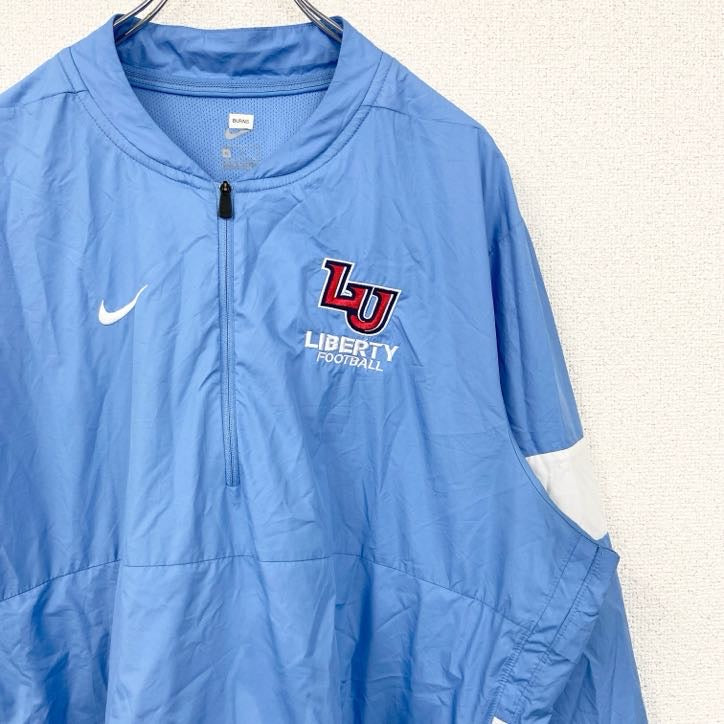 古着 used　NIKE　ナイキ　長袖ハーフジップナイロンジャケット　ワンポイント刺繍　フットボール　水色　XLサイズ