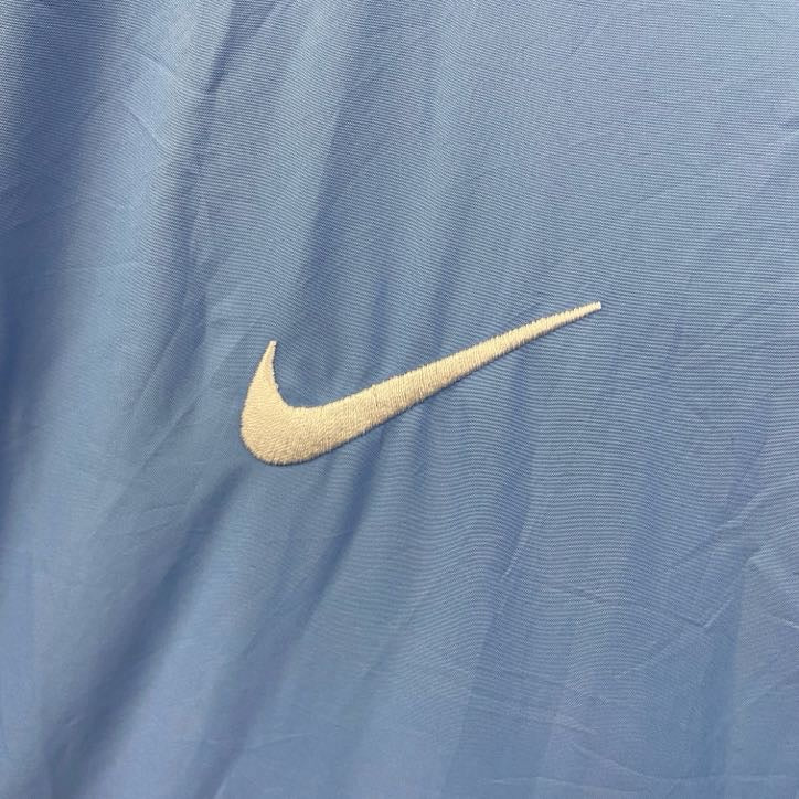 古着 used　NIKE　ナイキ　長袖ハーフジップナイロンジャケット　ワンポイント刺繍　フットボール　水色　XLサイズ