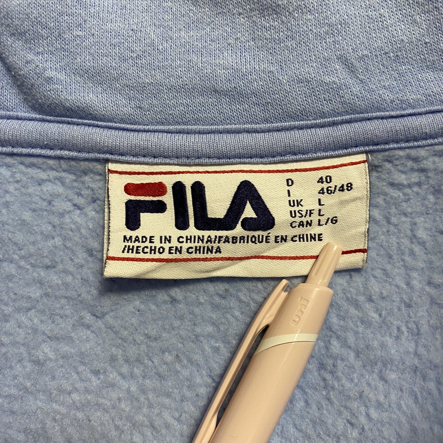 古着 used　FILA　フィラ　長袖ハーフジップスウェット　切り替えトレーナー　ワンポイント刺繍　水色　白　黒　秋冬服　Lサイズ