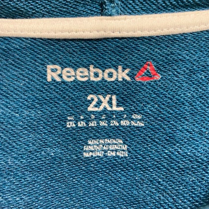 古着 used　Reebok　リーボック　長袖ワンポイント刺繍ジップアップパーカー　水色　秋冬服　ビッグシルエット　2XLサイズ