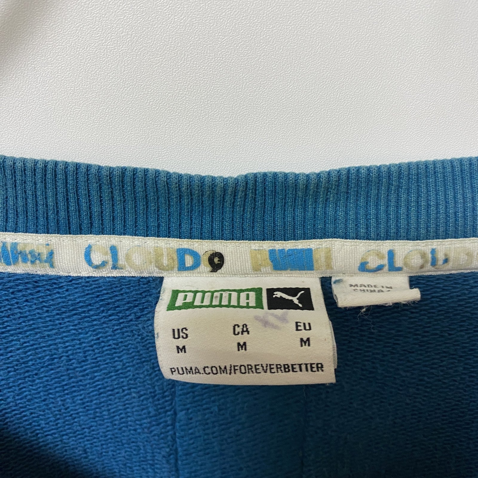 puma プーマ　CLOUD9　長袖デザインプリントスウェット　クルーネックトレーナー　Mサイズ　水色　　古着