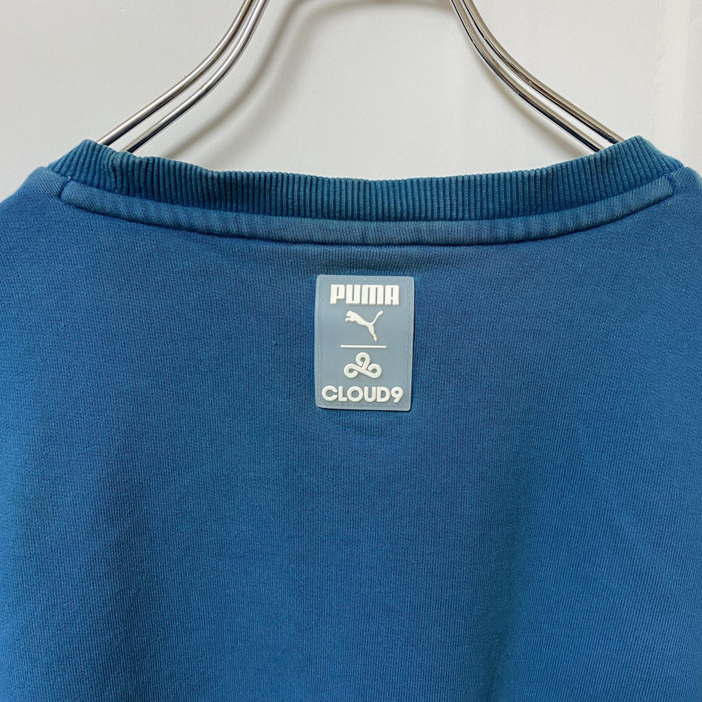 puma プーマ　CLOUD9　長袖デザインプリントスウェット　クルーネックトレーナー　Mサイズ　水色　　古着