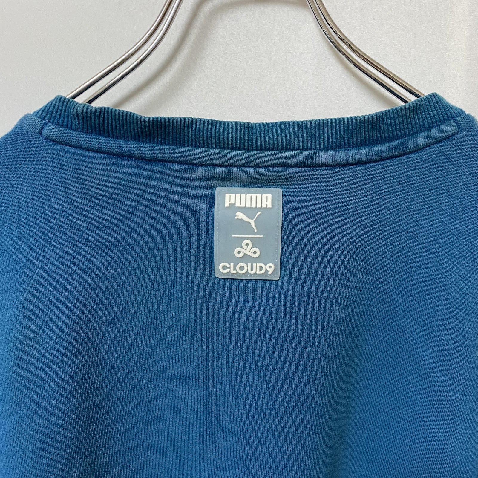 puma プーマ　CLOUD9　長袖デザインプリントスウェット　クルーネックトレーナー　Mサイズ　水色　　古着
