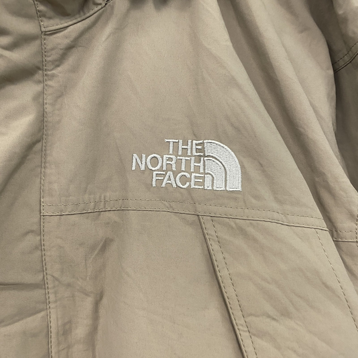 THE NORTH FACE　ザ・ノースフェイス　マウンテンパーカー　比翼仕立て　刺繍ロゴ　ベージュ　Sサイズ　古着