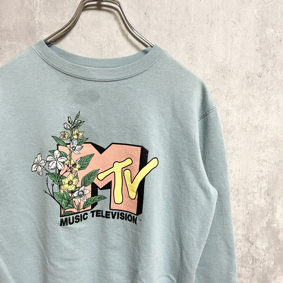MUSIC TELEVISION　長袖プリントスウェット　トレーナー　水色　クルーネック　秋冬服　Sサイズ　古着