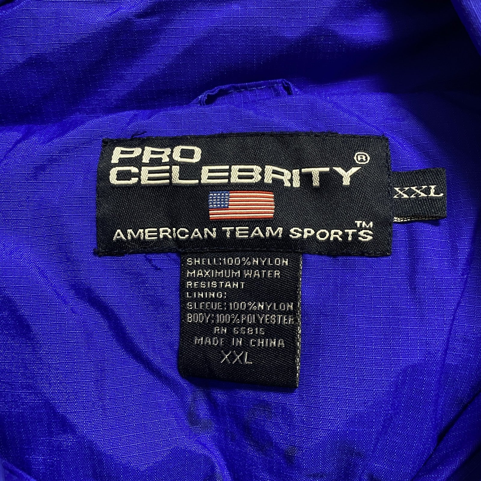 PRO CELEBRITY　長袖ハーフジップブルゾン　ポイント刺繍　FOLSOM　フットボール　青　ブルー　2XLサイズ　古着