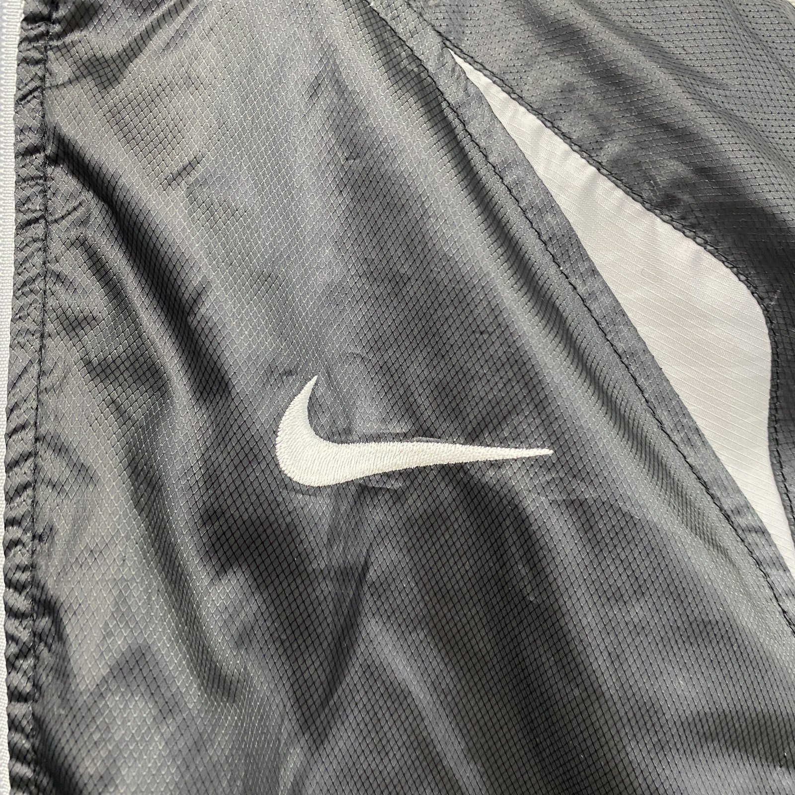 NIKE　ナイキ　トラックジャケット/ジャージパーカー　スウッシュ　黒　ブラック　Lサイズ　古着