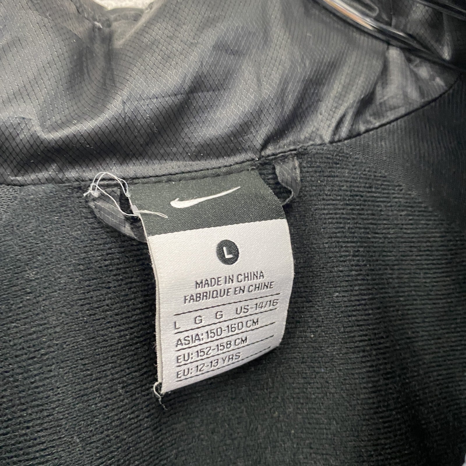NIKE　ナイキ　トラックジャケット/ジャージパーカー　スウッシュ　黒　ブラック　Lサイズ　古着