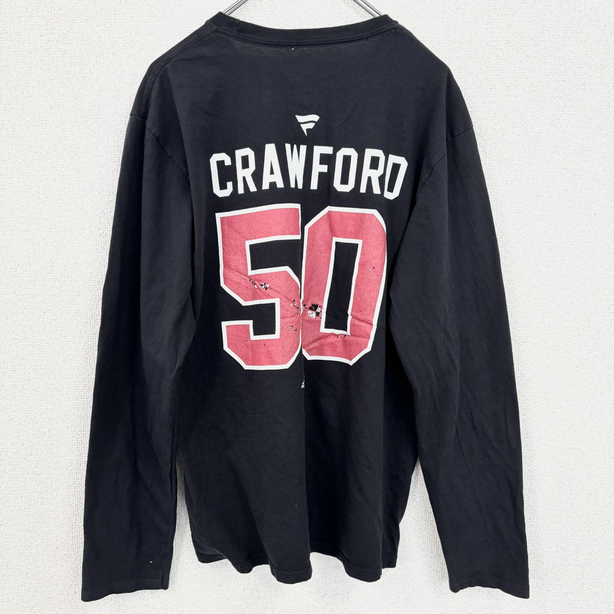 NHL シカゴブラックホークス　アイスホッケー　長袖オフィシャルプリントTシャツ　ロンＴ　黒　ブラック　Ｍサイズ　古着