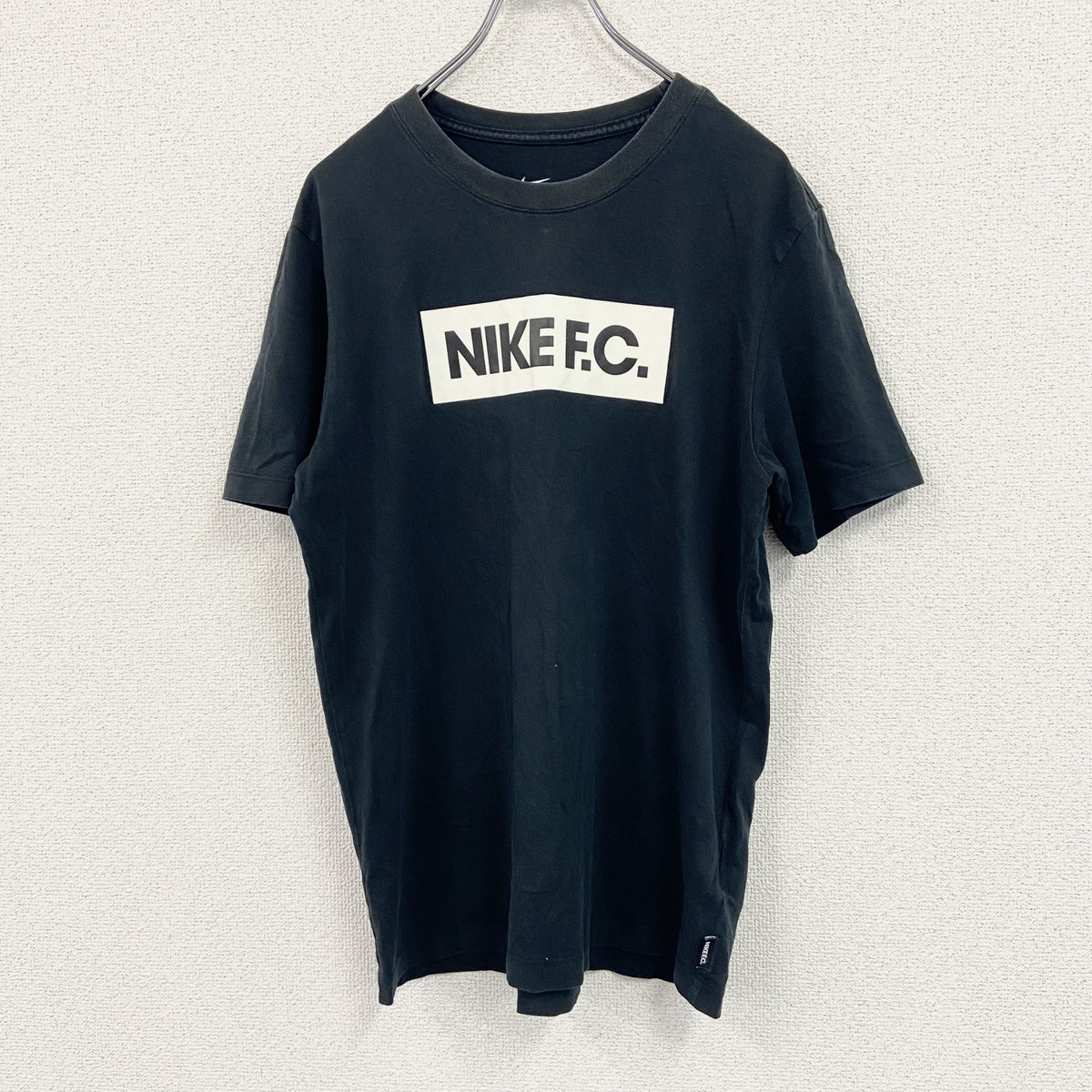 NIKE　ナイキ　半袖プリントTシャツ　黒　ブラック　Lサイズ カットソー メンズ コットン 古着