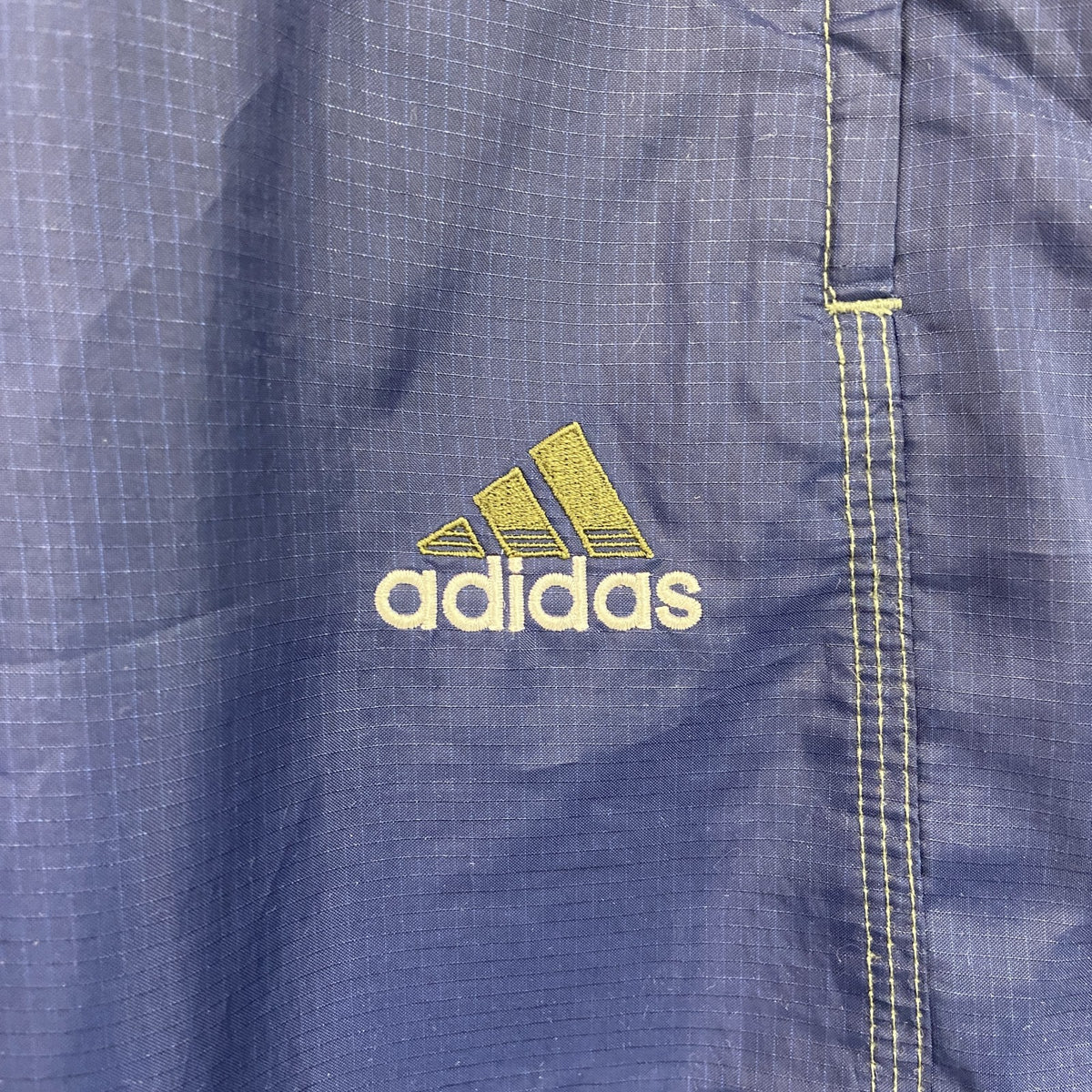 90s　adidas　アディダス　トラックパンツ/ジャージパンツ　リップストップ　パフォーマンスロゴ　ヴィンテージ　紺　ネイビー　Mサイズ　古着