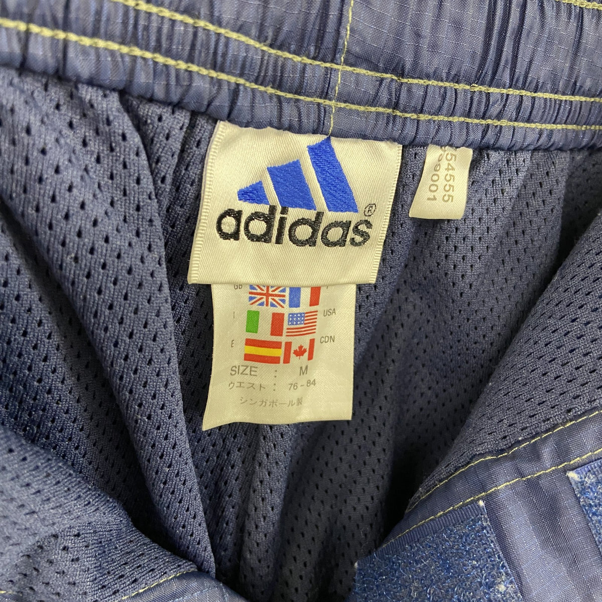 90s　adidas　アディダス　トラックパンツ/ジャージパンツ　リップストップ　パフォーマンスロゴ　ヴィンテージ　紺　ネイビー　Mサイズ　古着