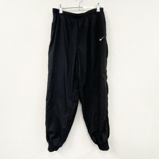 90s　NIKE　ナイキ　ナイロンパンツ　トラックパンツ　スウッシュ　ヴィンテージ　黒　ブラック　Lサイズ