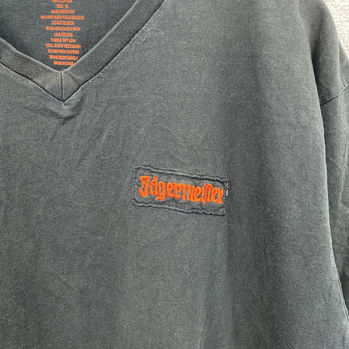 Jagermeister　半袖プリントTシャツ　VネックT　黒　ブラック　XLサイズ　古着