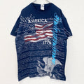 GILDAN　半袖ロゴプリントＴシャツ　英字　筆記体　アメリカ国旗　鷲　レトロデザイン　クルーネック　Lサイズ　古着