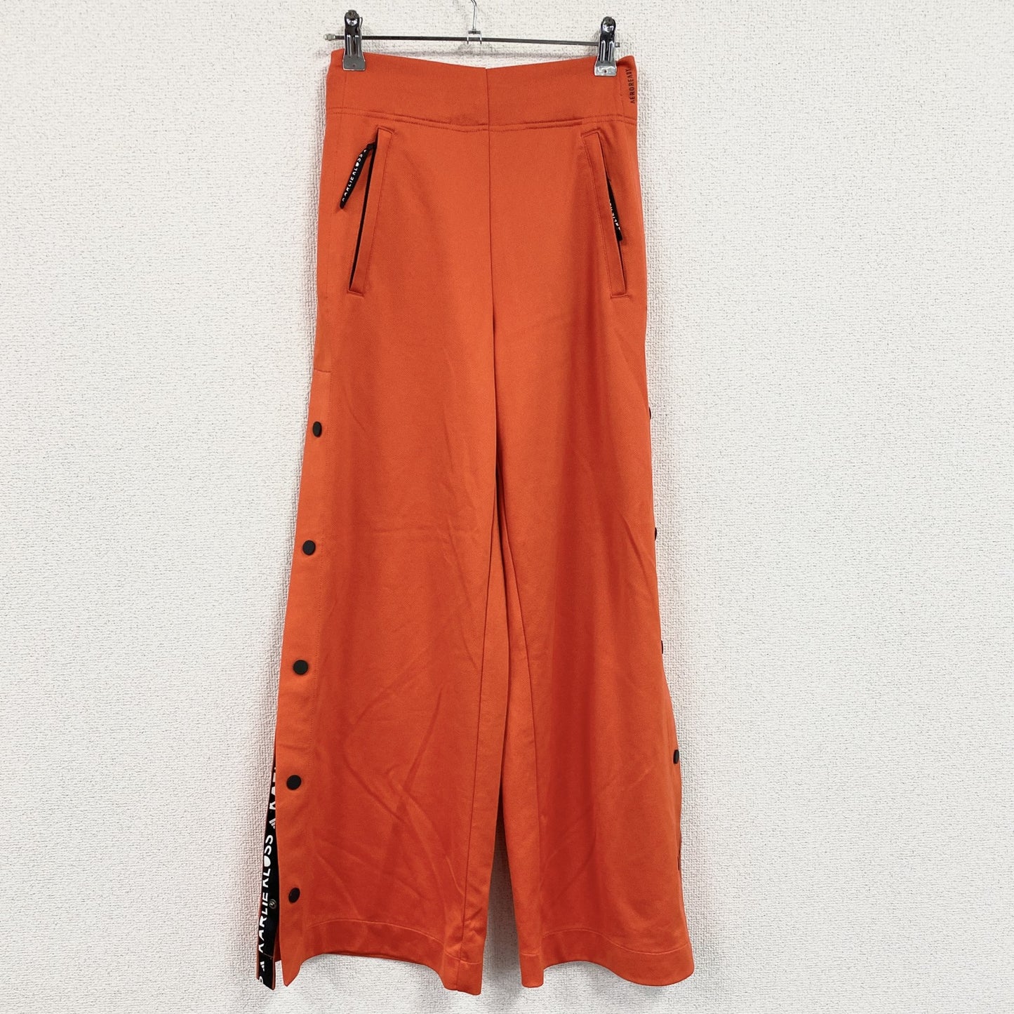 adidas　アディダス　KARLIE KLOSS　カーリー・クロス　ワイドフレアトラックパンツ　オレンジ　XSサイズ