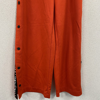 adidas　アディダス　KARLIE KLOSS　カーリー・クロス　ワイドフレアトラックパンツ　オレンジ　XSサイズ