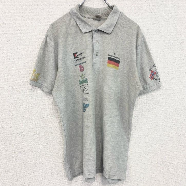 　FRUIT OF THE LOOM　半袖プリントポロシャツ　バックプリント　レトロ　国旗　灰　グレー　灰色　Lサイズ　古着