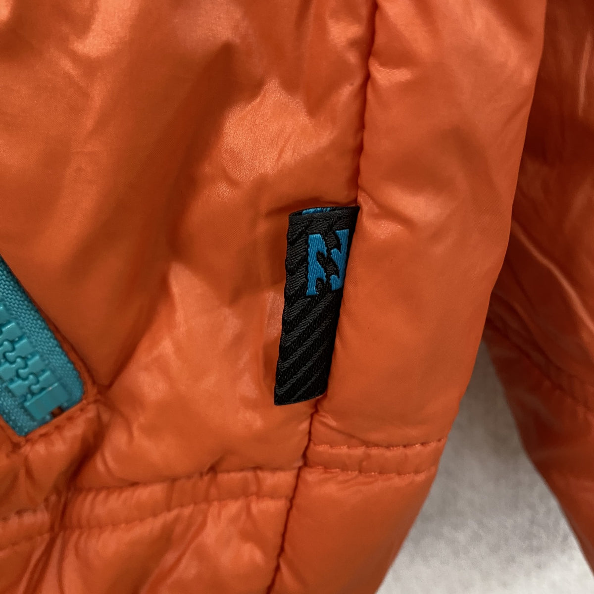 BILLABONG　ビラボン　フルジップナイロンジャケット　中綿入り　ハの字ポケット　リバーシブル　オレンジ　チェック柄　古着