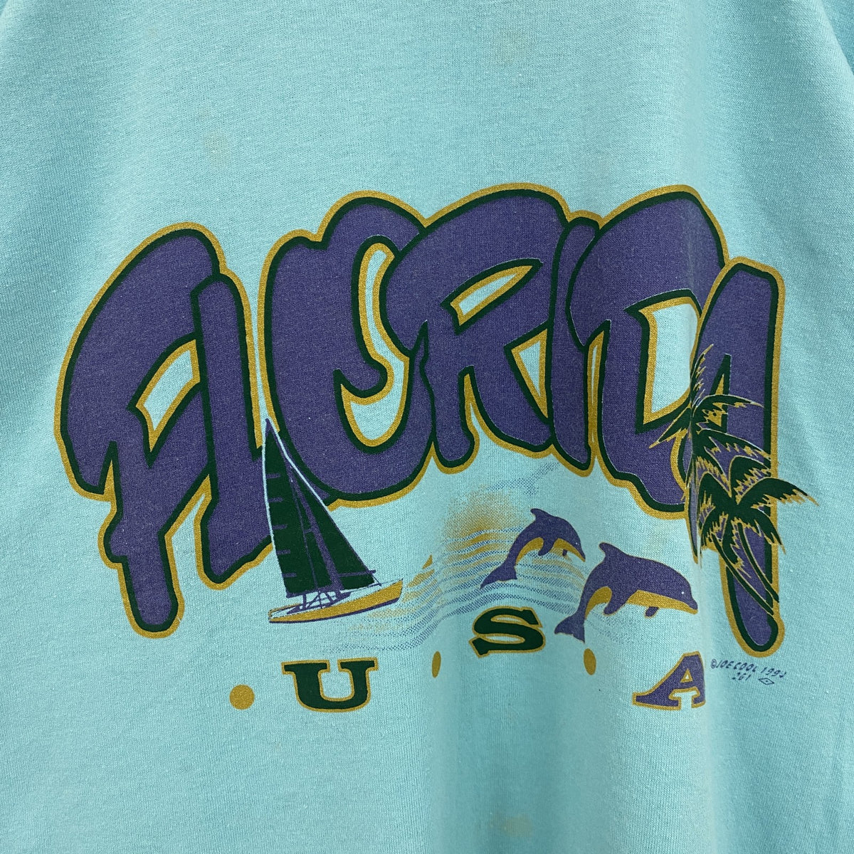 90s　1994　半袖プリントTシャツ　ヴィンテージ　クルーネック　レトロデザイン　水色　ライトブルー　XLサイズ　古着