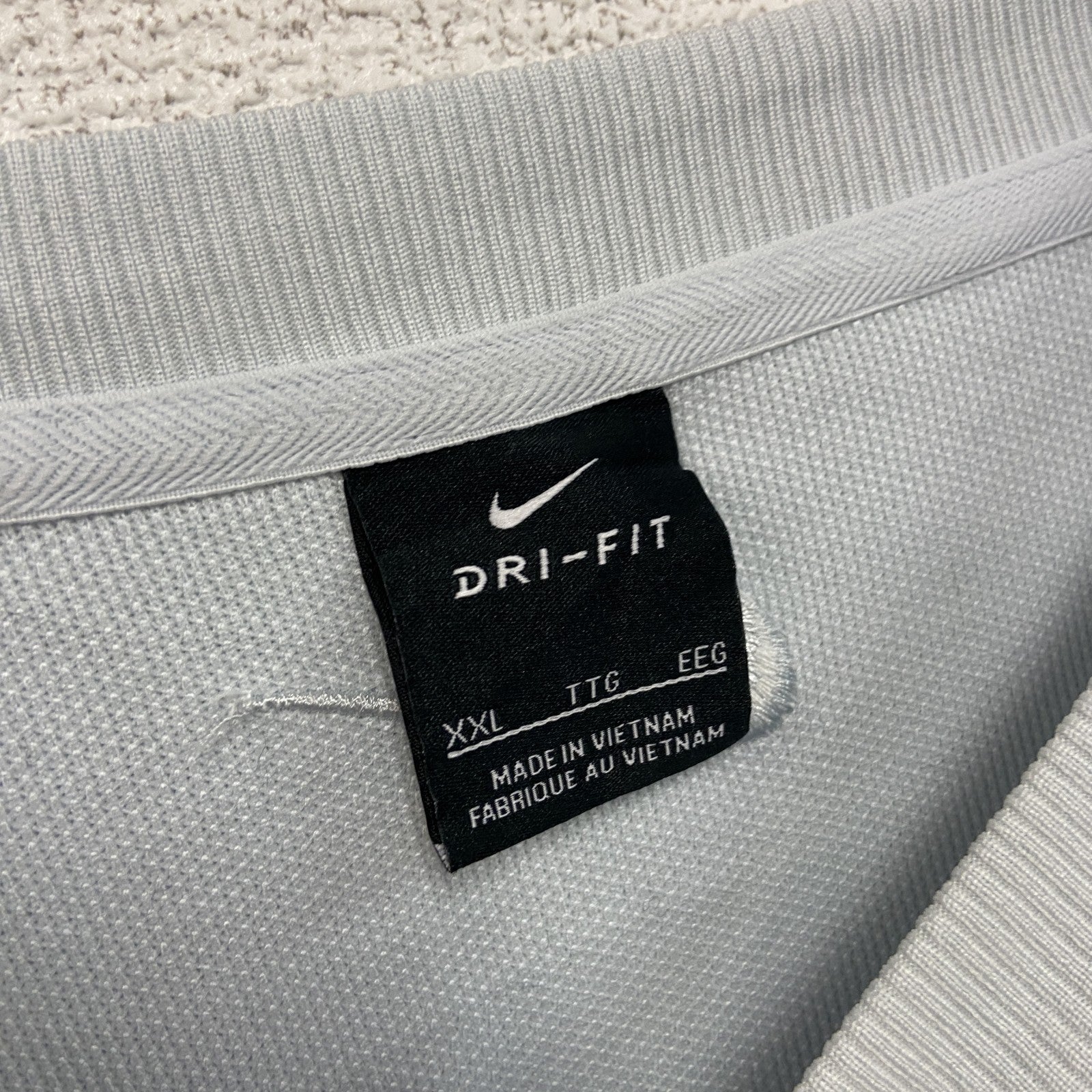 NIKE　ナイキ　ニットベスト　スウッシュ　水色　ライトブルー　2XLサイズ　古着