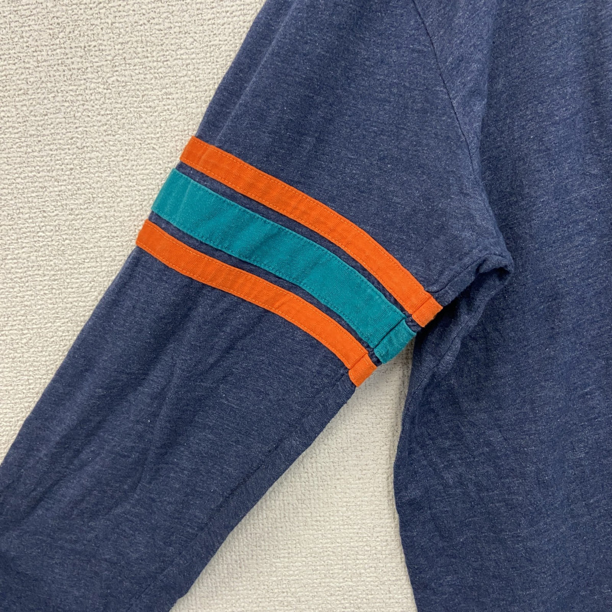 長袖プリントTシャツ　NFL　マイアミドルフィンズ　フットボール　紺　ネイビー　クルーネック　Lサイズ　古着