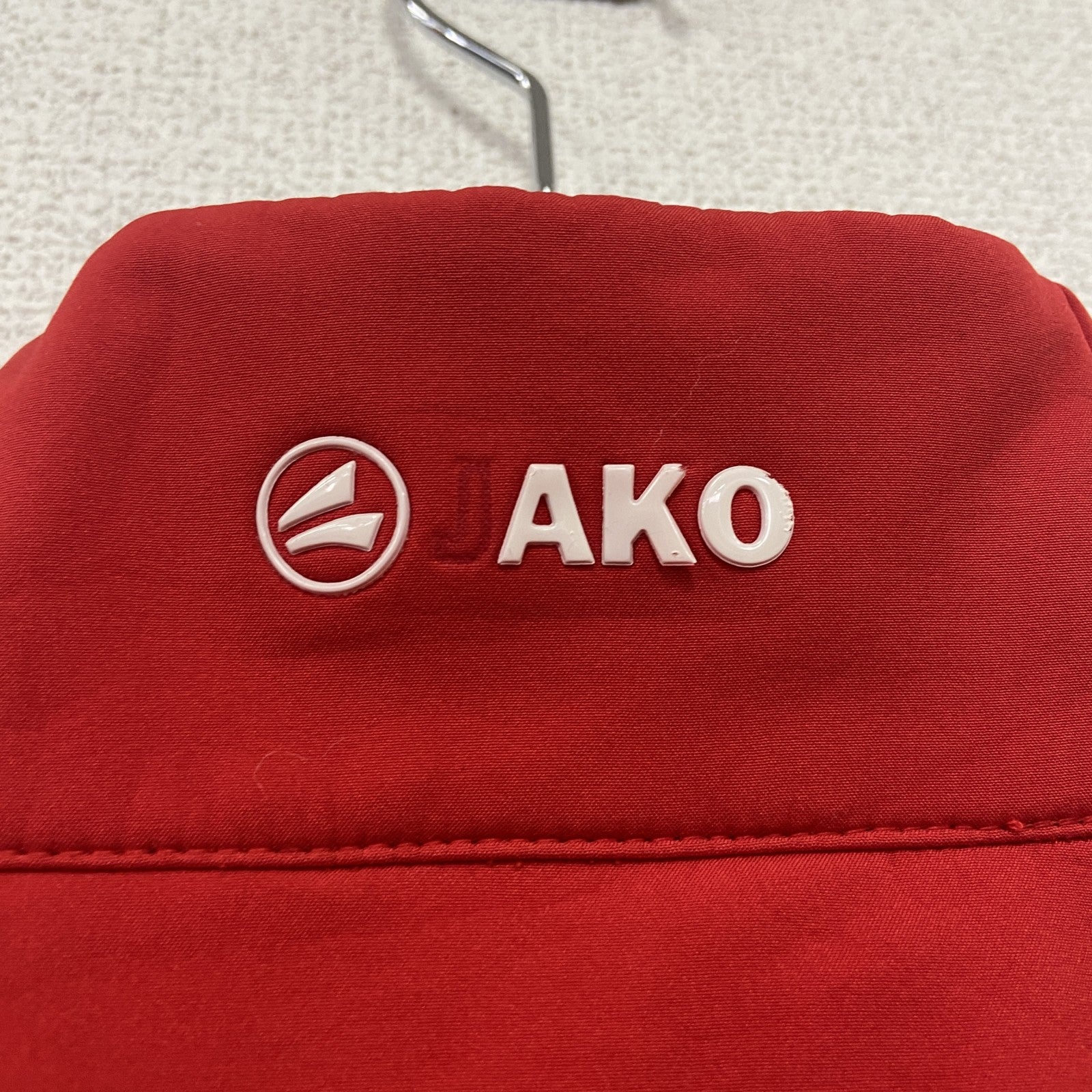 JAKO　トラックジャケット/ジャージ　ラグランスリーブ　英字プリント　赤　レッド　XLサイズ　古着