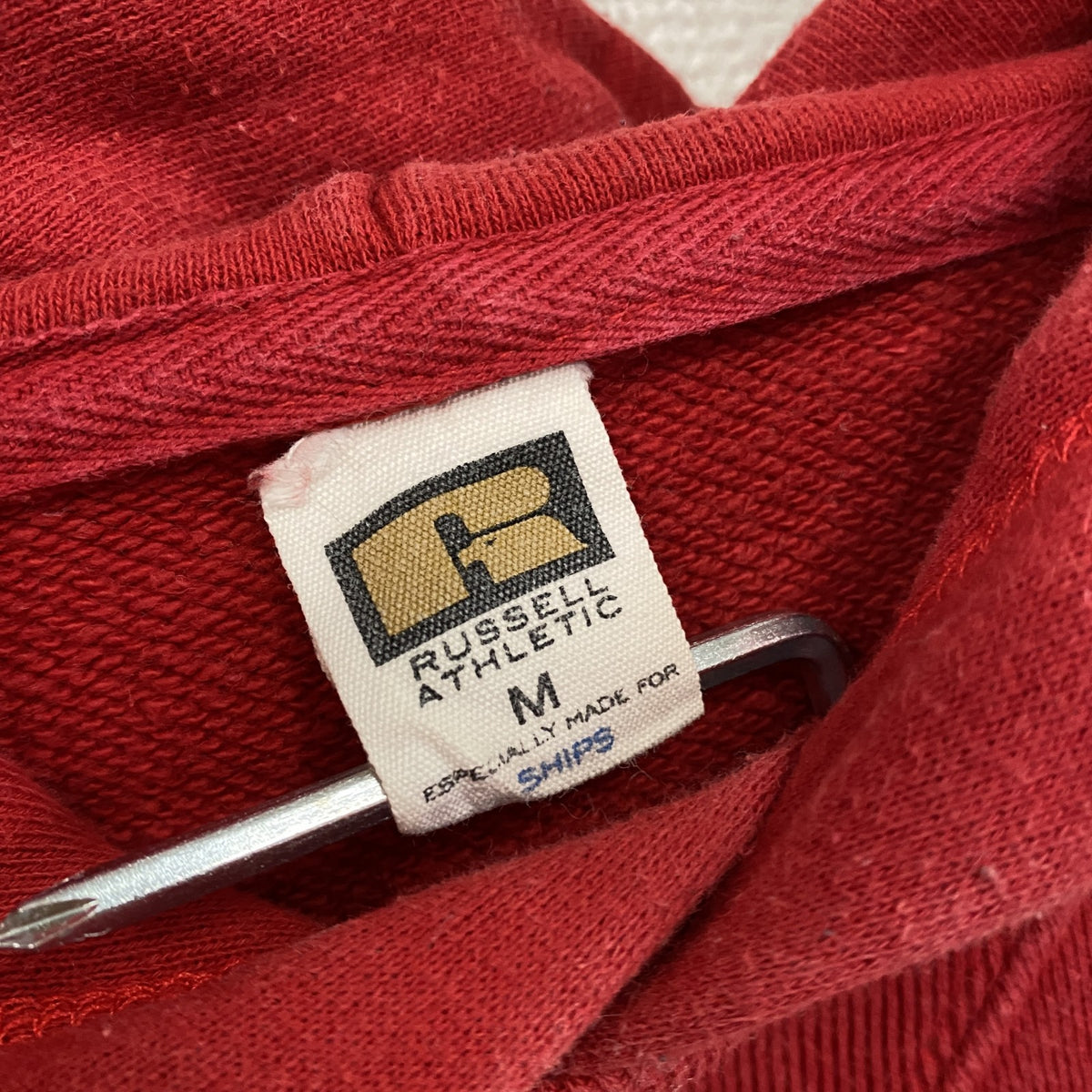 RUSSELL　ラッセル　スウェットパーカー/フーディー　カレッジプリント　前V　赤　レッド　Mサイズ　古着