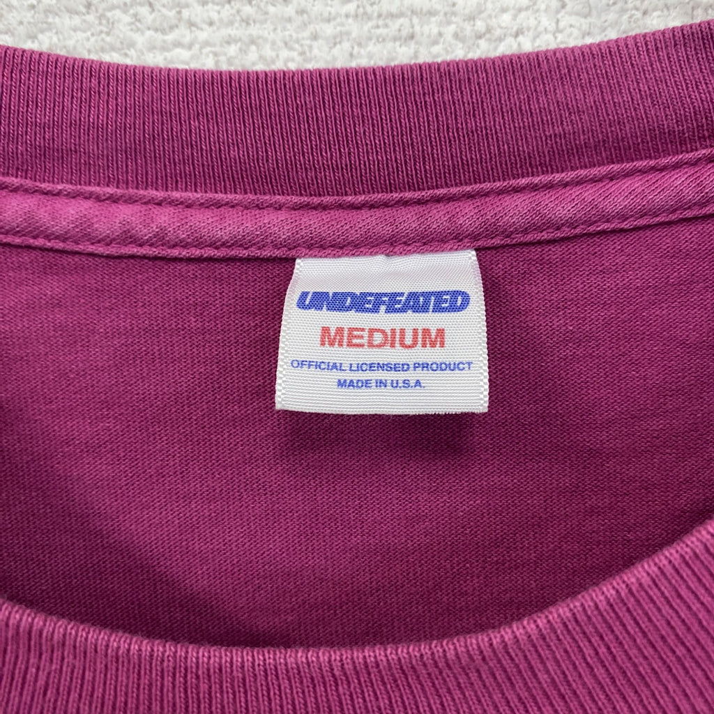 UNDEFEATED　アンディフィーテッド　半袖プリントTシャツ　ピンク　Mサイズ　　古着