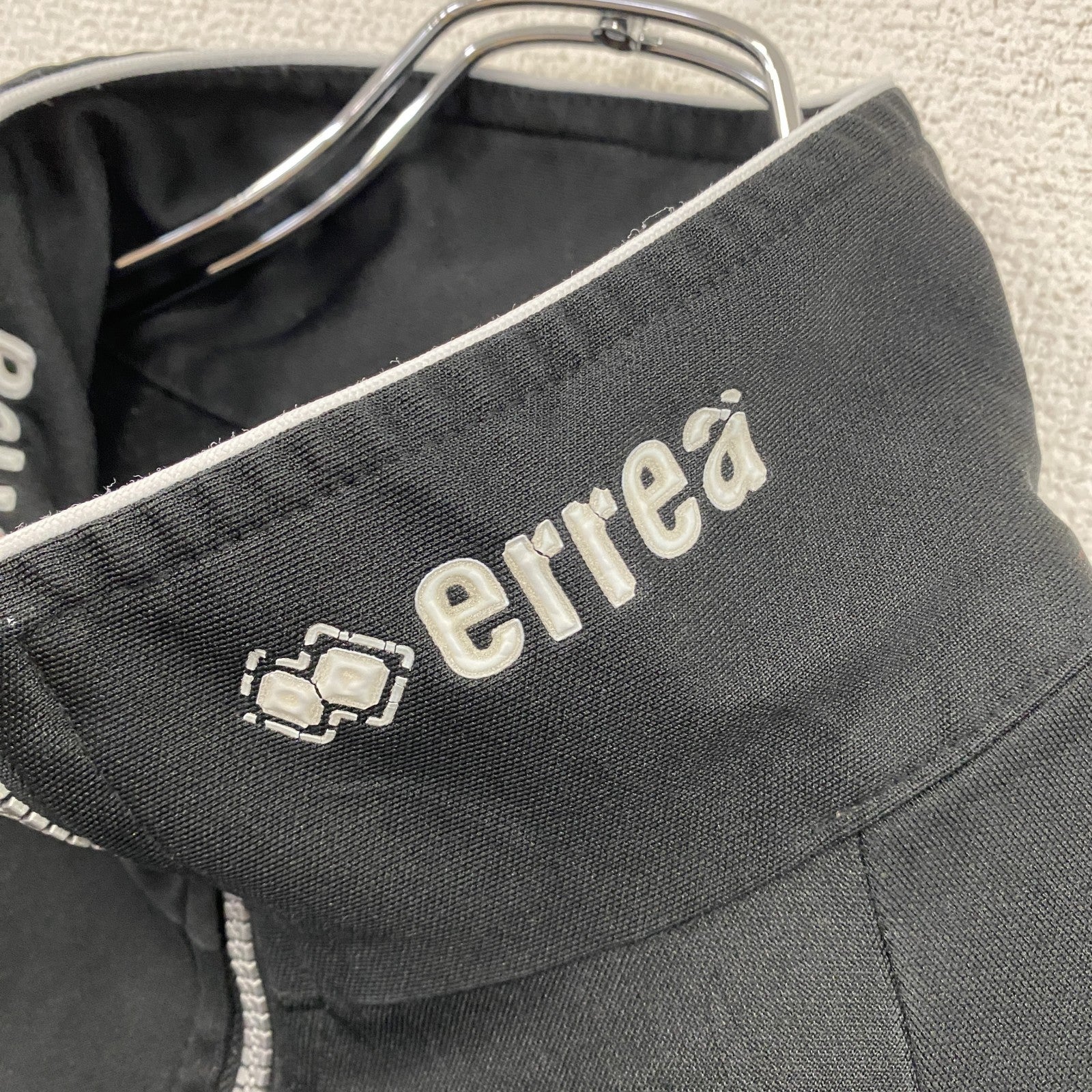 errea　トラックジャケット/ハーフジッププルオーバージャージ　黒　ブラック　Lサイズ　古着