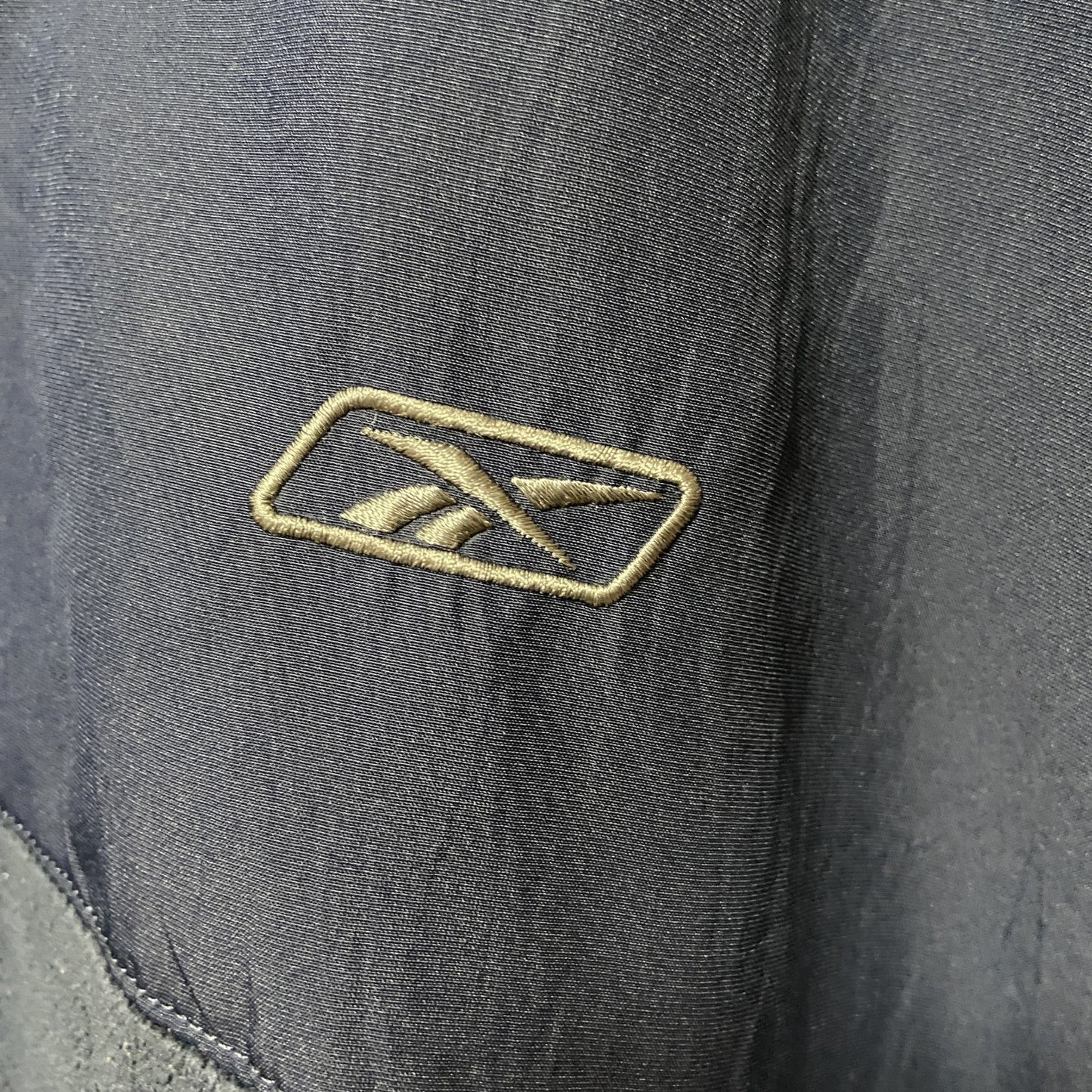古着 used　Reebok リーボック　長袖ハーフジップフリースジャケット　紺　ネイビー　ワンポイント刺繡ロゴ　XLサイズ