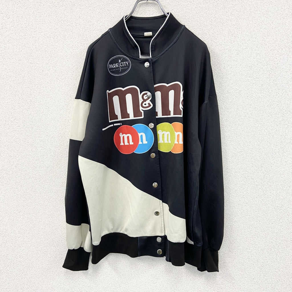 J.C fashion　M&M‘S　エムアンドエムズ　ブルゾン　スタジャン　企業ロゴ　ビッグデザイン　チョコレート　黒　ブラック　古着