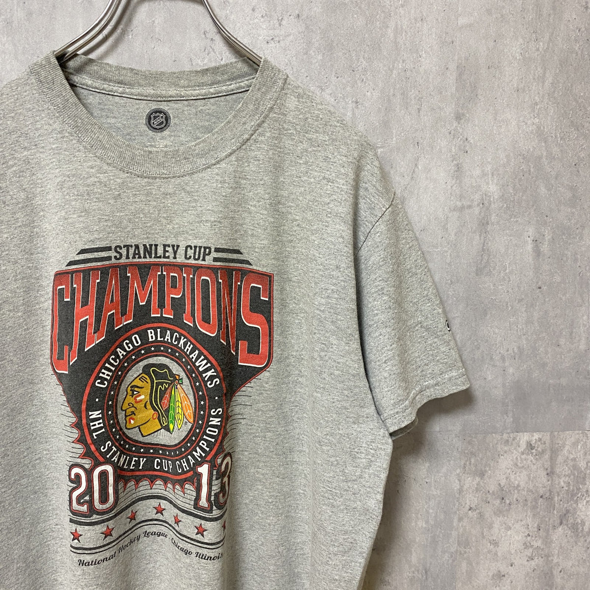 NHL シカゴブラックホークス　アイスホッケー　半袖オフィシャルプリントTシャツ　スポーツ　グレー　灰色　Lサイズ　古着