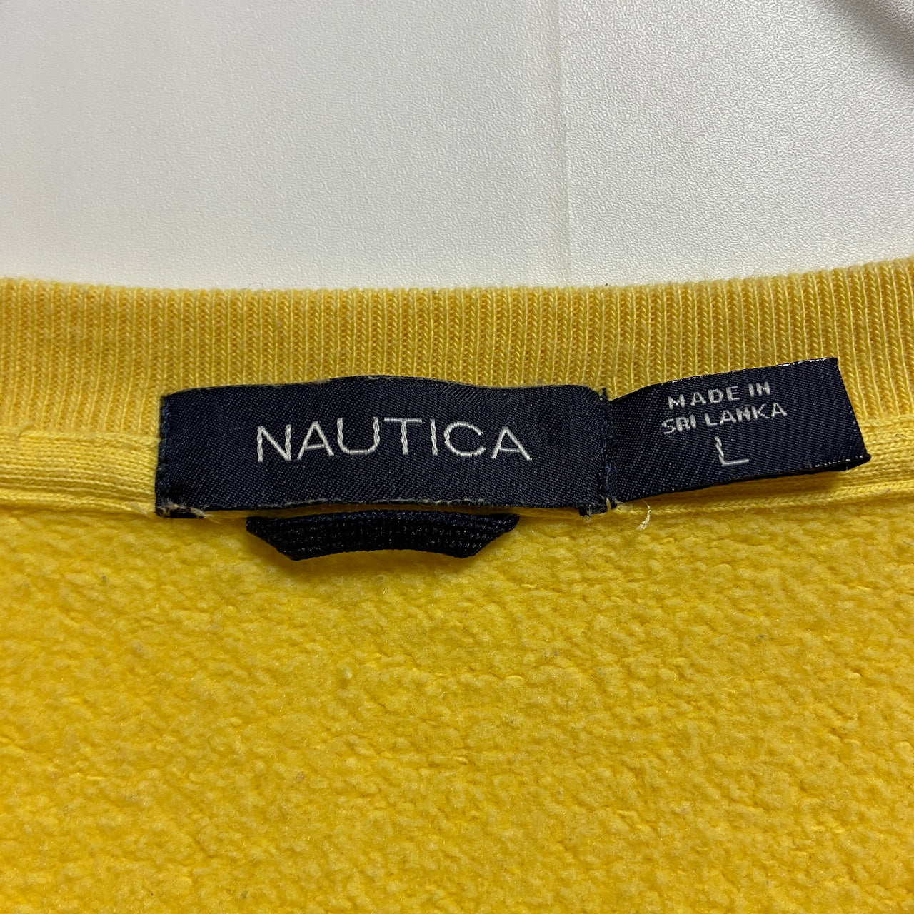 古着 used　NAUTICA　ノーティカ　長袖ワンポイント刺繍スウェット　トレーナー　クルーネック　黄色　秋冬服　Lサイズ